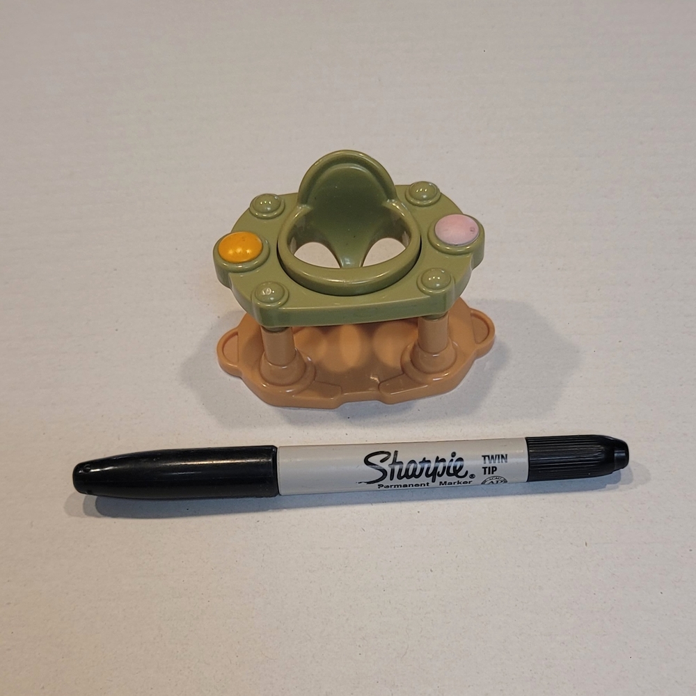 Green and Tan Baby Toy